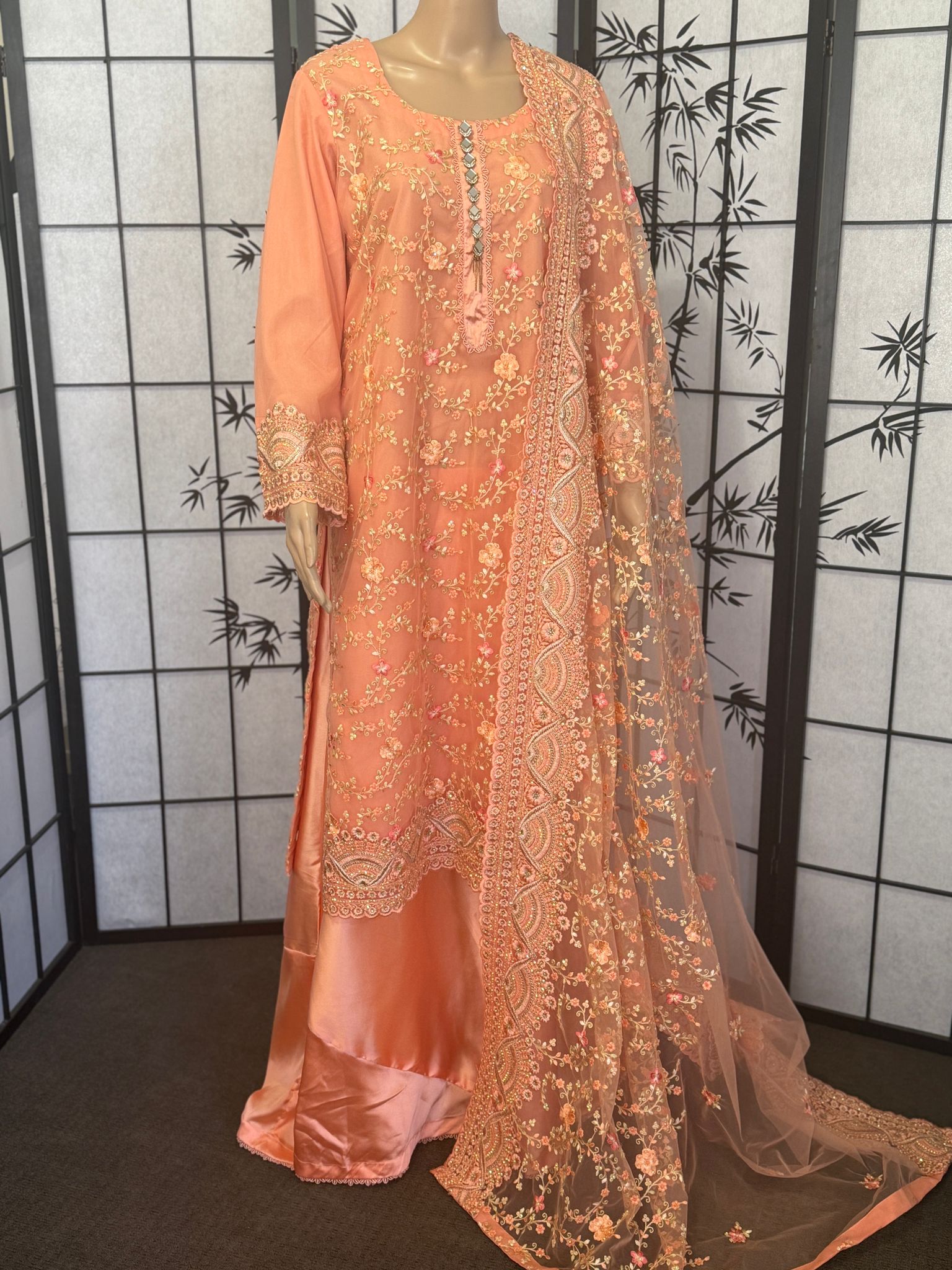 Exclusive Fully Embroidered Net Ensemble